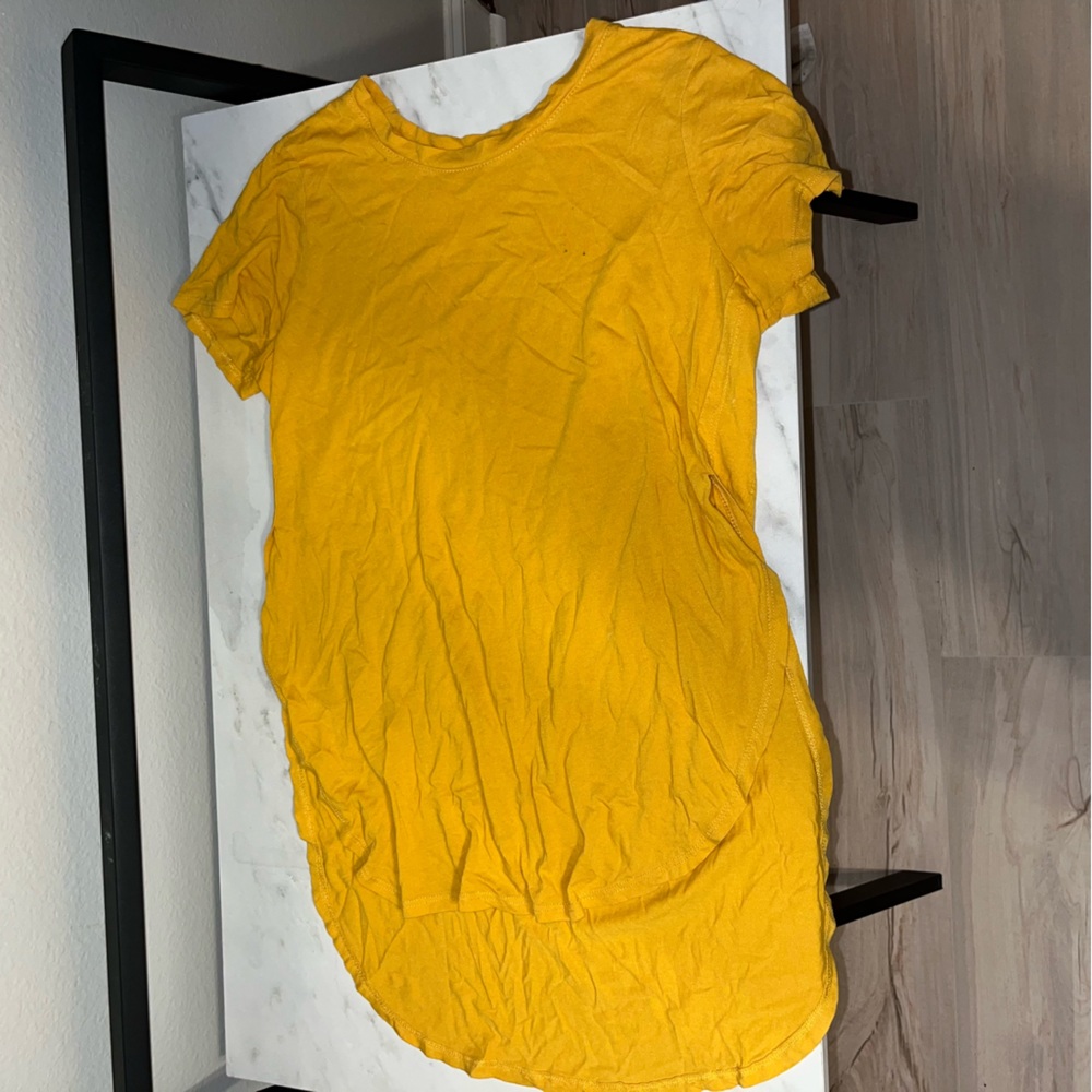 Gold blouse with long back and short front